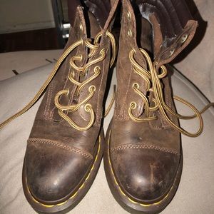 Brown Dr. Marten boots.